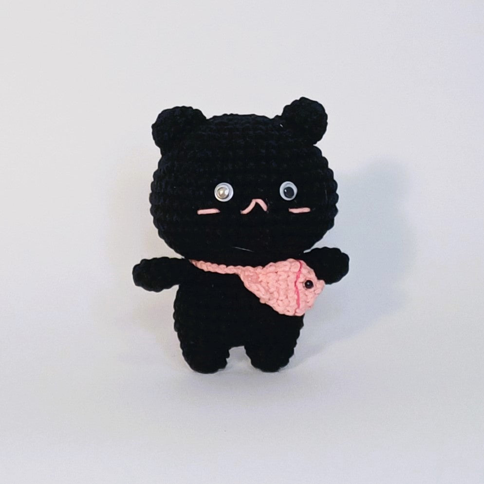 Handmade crochet of the black cat with a fish bag